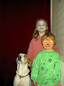 Kids with Caleb, the Kalahari hunting dog