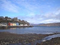 The painted houses in Tobermory, notice the weather change!