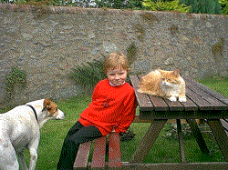 Alex with Caleb and Lucie the Botswana cat